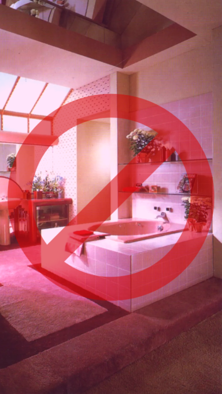 prohibited sign over a pink carpeted bathroom from the 70's era
