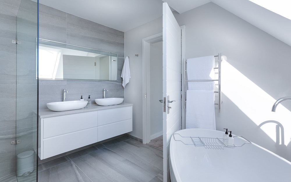 crisp, white bathroom with high-end building materials
